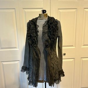 Vintage concept open cardigan with ruffles. Multiple shades of grey